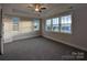 Spacious main bedroom with tray ceiling, ceiling fan, and multiple windows at 283 Luray Way # 449, Rock Hill, SC 29730