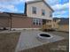 View of the rear of the home featuring a backyard patio and fire pit at 287 Luray Way # 450, Rock Hill, SC 29730