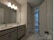 Beautiful bathroom features double vanity and marble-style floors at 287 Luray Way # 450, Rock Hill, SC 29730