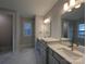 Bright bathroom features double vanity, mirror and window at 287 Luray Way # 450, Rock Hill, SC 29730