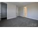 Spacious bedroom features neutral tones and a walk-in closet for ample storage at 287 Luray Way # 450, Rock Hill, SC 29730