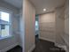 Spacious walk-in closet features shelving and a window at 287 Luray Way # 450, Rock Hill, SC 29730