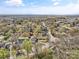 An aerial view of the neighborhood with lush trees at 311 3Rd Avenue Se Dr, Hickory, NC 28602