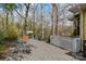 Backyard features a deck and pea gravel parking area at 311 3Rd Avenue Se Dr, Hickory, NC 28602