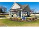Community park area with covered picnic shelter, landscaping and walking path at 3237 Vermillion Dr, Harrisburg, NC 28075