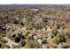 Aerial view showcasing neighborhood and the tree-lined streets and community layout at 3329 Brownes Creek Rd, Charlotte, NC 28269