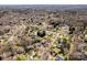 The community is surrounded by dense woods at 3329 Brownes Creek Rd, Charlotte, NC 28269