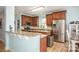 Open kitchen design, stainless steel appliances, and granite countertops at 3329 Brownes Creek Rd, Charlotte, NC 28269