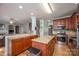 Spacious kitchen with stainless steel appliances, and breakfast bar island at 3329 Brownes Creek Rd, Charlotte, NC 28269