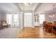 Bright, open-concept living room featuring hardwood floors, natural light, and elegant architectural details at 3329 Brownes Creek Rd, Charlotte, NC 28269