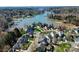 Beautiful aerial view showcasing a lakeside community with lush greenery and waterfront properties at 371 Montibello Dr, Mooresville, NC 28117