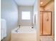 Bathroom with a soaking tub and glass enclosed shower at 371 Montibello Dr, Mooresville, NC 28117