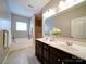 Bathroom with double vanity, tub, and a separate shower for modern comfort at 371 Montibello Dr, Mooresville, NC 28117