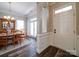 Dining room with hardwood floors is adjacent to the front entry of the house at 371 Montibello Dr, Mooresville, NC 28117