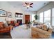 Inviting living room with a fireplace and comfortable seating at 371 Montibello Dr, Mooresville, NC 28117