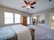 Expansive main bedroom offers a sitting area and doorway to the main bathroom at 371 Montibello Dr, Mooresville, NC 28117