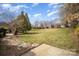 A well-manicured lawn in the backyard creates a serene outdoor space at 4421 3Rd Nw St, Hickory, NC 28601