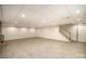 Large finished basement with wood-look flooring, recessed lighting, and a staircase at 4421 3Rd Nw St, Hickory, NC 28601