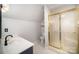 The bathroom features a glass shower with a gold frame and a white vanity at 4421 3Rd Nw St, Hickory, NC 28601