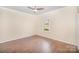 Bedroom featuring hardwood floors and a window at 4421 3Rd Nw St, Hickory, NC 28601