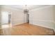 Dining room with hardwood floors and chandelier at 4421 3Rd Nw St, Hickory, NC 28601