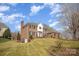 Brick home with mature trees in the yard at 4421 3Rd Nw St, Hickory, NC 28601