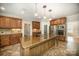 Gourmet kitchen featuring a large island, stainless steel appliances and custom cabinets at 4421 3Rd Nw St, Hickory, NC 28601