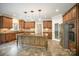 Spacious kitchen with stainless steel appliances, large island, and custom cabinetry at 4421 3Rd Nw St, Hickory, NC 28601