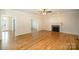 Living room with hardwood flooring, fireplace and an open floor plan at 4421 3Rd Nw St, Hickory, NC 28601