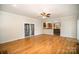 Open concept living room with hardwood floors, open to the kitchen and patio at 4421 3Rd Nw St, Hickory, NC 28601