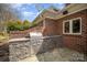 Outdoor kitchen features a built-in grill, stone accents, and counter space at 4421 3Rd Nw St, Hickory, NC 28601