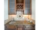 Wet bar featuring granite countertops and custom cabinetry at 4421 3Rd Nw St, Hickory, NC 28601