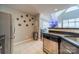 Featuring stainless steel appliances and granite countertops, the open kitchen offers a sleek, modern design at 513 N Graham St # 3H, Charlotte, NC 28202