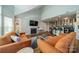 Bright living room featuring vaulted ceilings, fireplace, and views to the kitchen and dining areas at 513 N Graham St # 3H, Charlotte, NC 28202