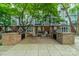 Outdoor grilling area with built-in grills and seating, perfect for entertaining and enjoying the outdoors at 513 N Graham St # 3H, Charlotte, NC 28202