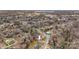 Aerial view of a neighborhood with a red-roofed home highlighted with an arrow at 514 3Rd Avenue Se Dr, Hickory, NC 28602