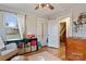 Bright bedroom with a large window, a wooden floor, and a neutral color palette at 514 3Rd Avenue Se Dr, Hickory, NC 28602