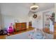 Bedroom featuring hardwood floors, neutral walls, and changing table at 514 3Rd Avenue Se Dr, Hickory, NC 28602