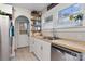 Bright kitchen featuring butcher block counters, white cabinets, stainless steel appliances, and open shelving at 514 3Rd Avenue Se Dr, Hickory, NC 28602