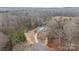 Expansive aerial view of home on large lot surrounded by mature trees and landscaping at 558 Edmunds Ln # 41, Clover, SC 29710