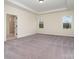 Spacious primary bedroom with plush carpet, natural light, and en-suite bathroom access at 558 Edmunds Ln # 41, Clover, SC 29710