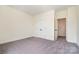 Bedroom with neutral walls and carpet and double closet doors at 558 Edmunds Ln # 41, Clover, SC 29710