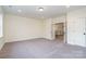Bonus room with neutral walls and carpet, with french doors ahead at 558 Edmunds Ln # 41, Clover, SC 29710