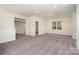 Spacious bonus room with neutral walls and carpet, and a view outside at 558 Edmunds Ln # 41, Clover, SC 29710