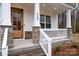 Inviting front entrance with stone accents, wood door, and stylish address number at 558 Edmunds Ln # 41, Clover, SC 29710