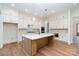 Bright kitchen with a large island, custom cabinets, and modern appliances for the inspired home chef at 558 Edmunds Ln # 41, Clover, SC 29710