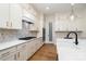 Beautiful kitchen featuring white cabinets, quartz countertops, and a decorative backsplash at 558 Edmunds Ln # 41, Clover, SC 29710