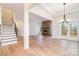 Open living area with hardwood floors, fireplace, and stairs leading to the upper level at 558 Edmunds Ln # 41, Clover, SC 29710