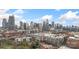 Aerial view of the city skyline, showing the apartment buildings and urban landscape at 710 W Trade St # 309, Charlotte, NC 28202