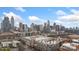 High angle view of the buildings, the city skyline, and beautiful clear skies at 710 W Trade St # 309, Charlotte, NC 28202